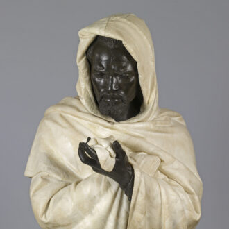 <div class="ira-title"><i>Othello</i></div>
<div class="ira-detail">Pietro Calvi (Italian, 1833–1884)</div>
<div class="ira-detail">ca. 1873</div>
<div class="ira-detail">marble and bronze, approx. 34<sup>5</sup>⁄<sub>8</sub> × 22<sup>1</sup>⁄<sub>16</sub> × 22<sup>13</sup>⁄<sub>16</sub> in.</div>
<div class="ira-detail"><a href="https://thewalters.org/" target="_blank" rel="noopener noreferrer">The Walters Art Museum, Baltimore</a></div>
<div class="ira-reference"><a href="http://art.thewalters.org/detail/98789/" target="_blank" rel="noopener noreferrer">27.609</a></div>
<div class="ira-comment">This life-size bust represents Othello, holding his wife’s handkerchief at the moment he realizes that she is innocent. Note the tear on his cheek. At a time when nineteenth-century artworks in the “orientalist” or “ethnographic” tradition often depicted Asian or African people as exotic, lazy, or savage types, Calvi produced a thoughtful, emotional portrait of an individual. Although it was crafted shortly after Aldridge’s death, it was almost certainly inspired by Aldridge. Aldridge’s image had circulated widely in print; he was famous across Europe as the pre-eminent African-American actor and most recognizable actor to play Othello.</div>
<a href="https://www.chesapeakeshakespeare.com/ira/exhibit/ira-img-23" target="_blank" rel="noopener noreferrer"><div class="ira-osdlink"><img src="https://www.chesapeakeshakespeare.com/wp-content/uploads/openseadragon-small.png" style="width:32px;height:32px;">Zoom</div></a>